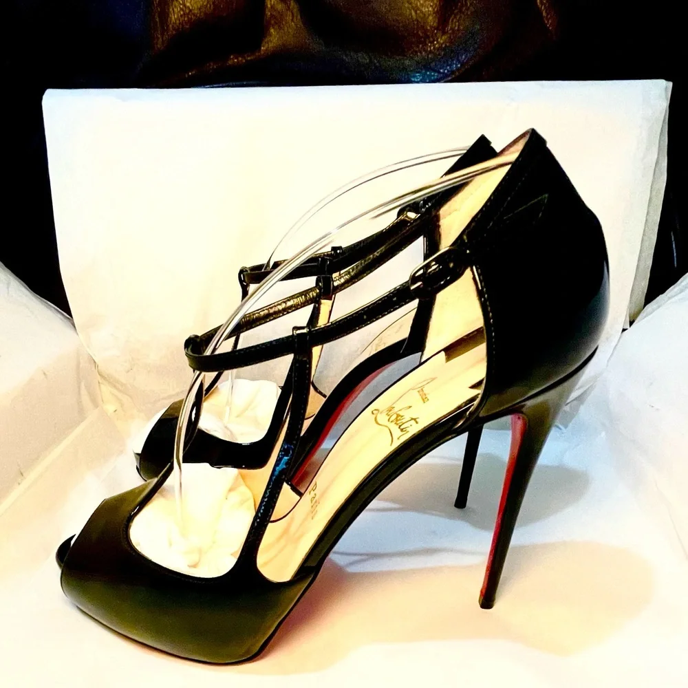 Christian Louboutin caged ankle strap peeptoe pumps. Glossy patent black 38.5